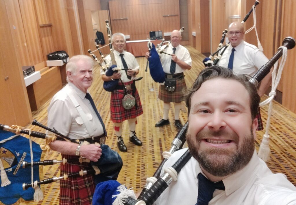 The British Club Bangkok Pipe Band warming up for the St. Andrews ball in Bangkok Thailand.