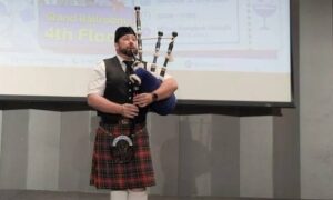 bagpiper at an education seminar in Bangkok Thailand