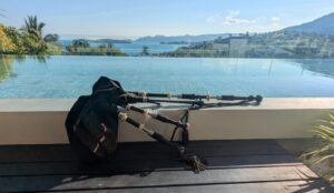bagpipes laid down on a bench in front of a beautiful view in Koh Samui