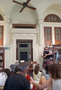 Bagpiping inside the Neilson Hays Library in Bangkok Thailand